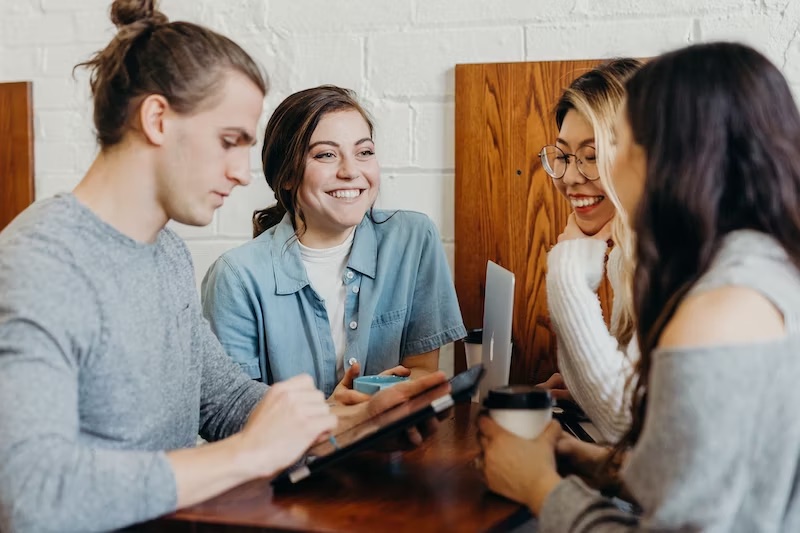 The Avoflow team collaborating around a table